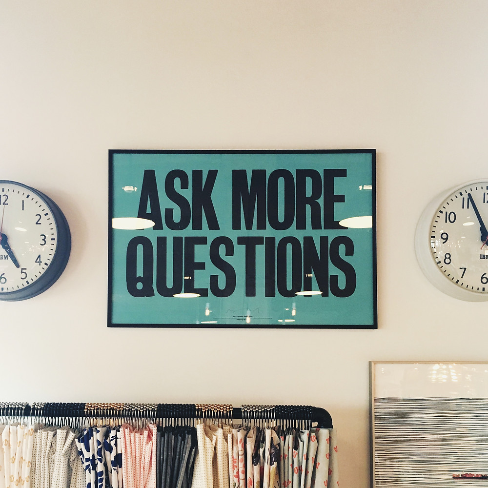 Ask more questions sign