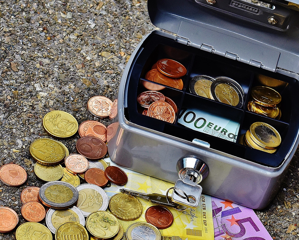 Box full of coins euros