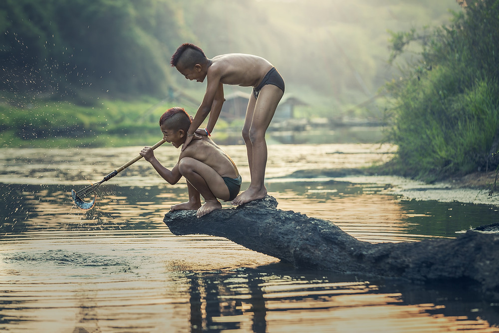 Children having fun fishing