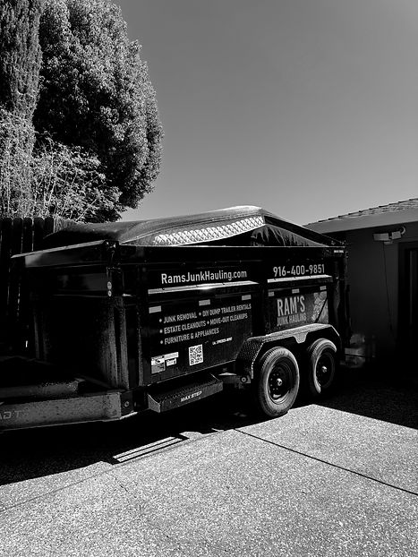 dump trailer parked in a driveway
