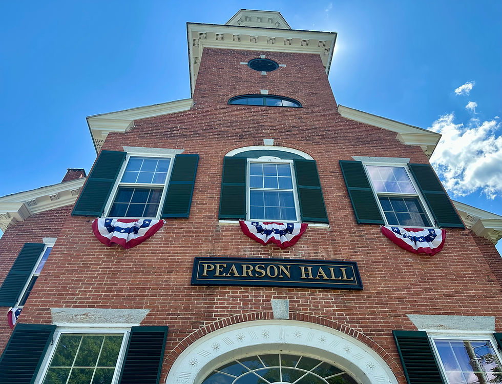 Pearson Hall brick building with patriotic bunting.