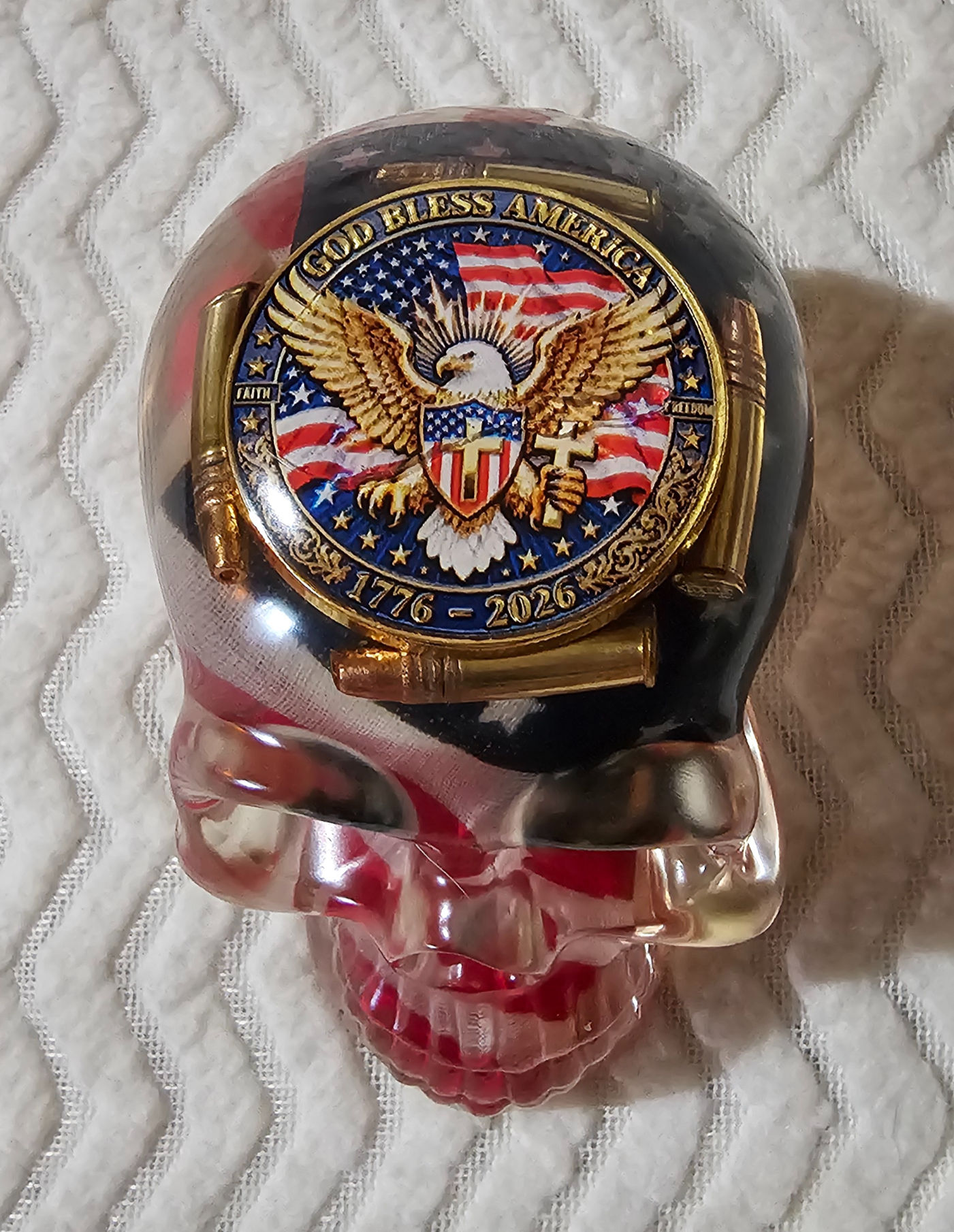 Skull with American flag and 250 yr coin with live .22 rounds