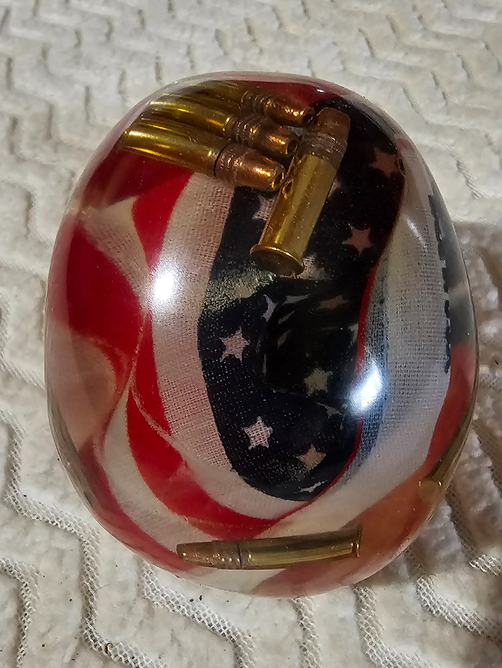 Thumbnail: Skull with American flag and live .22 rounds