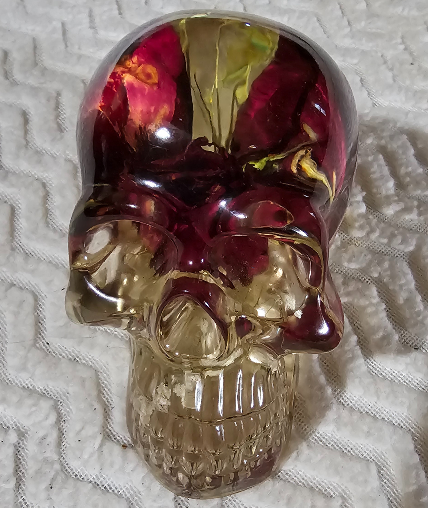 Skull with three red roses and babies breath