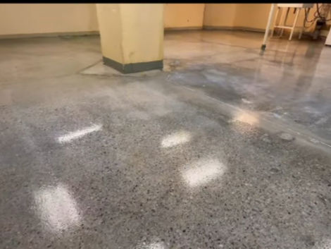 Shimmering concrete floor by Lo and Behold Epoxy Coating in Calgary