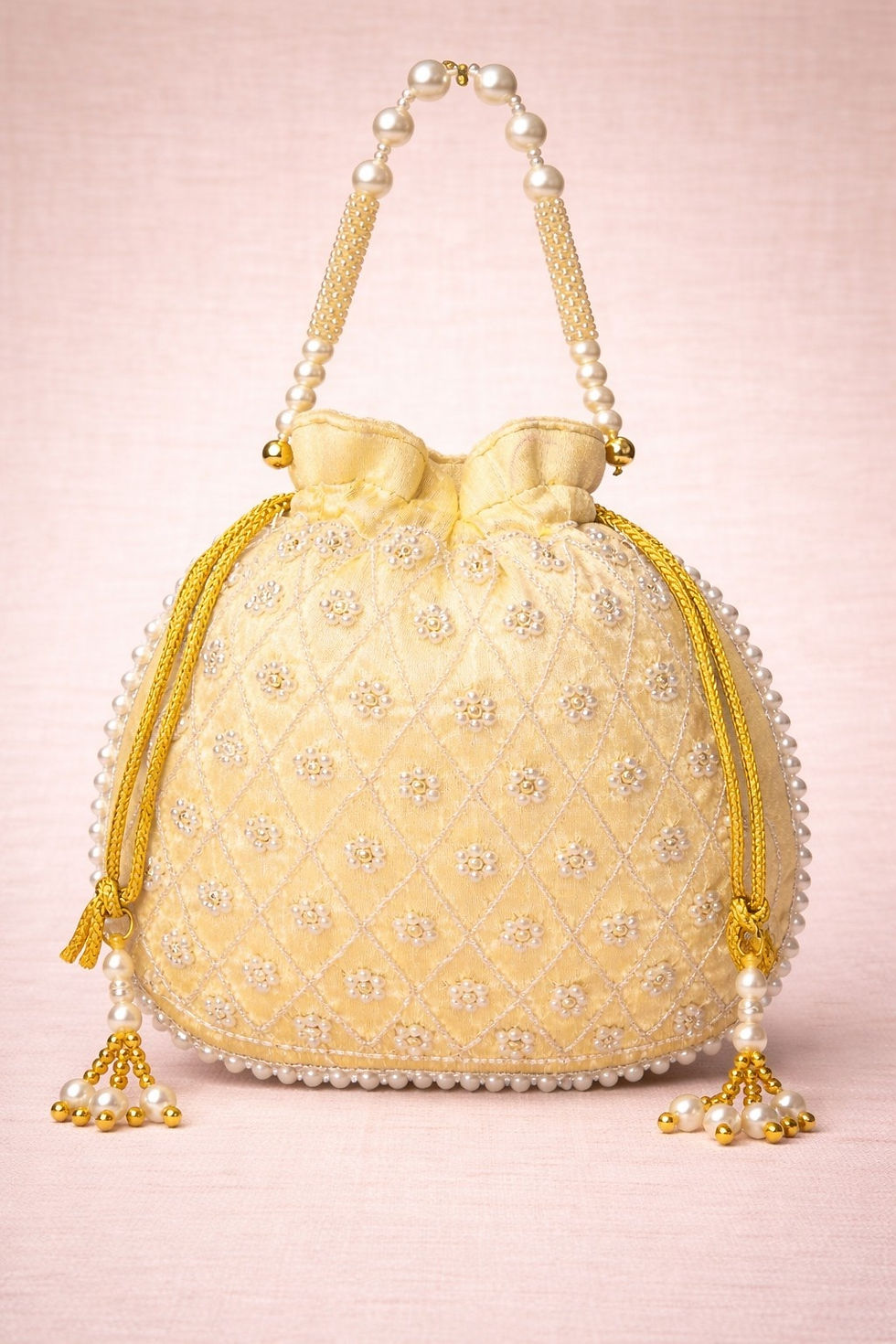 Thumbnail: athizay champagne beige Elegant Pearl Floral design Embroidered Potli Bag