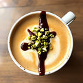 hot latte, Housemade pistachio syrup and chocolate sauce topped with pistachio cold foam, 