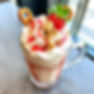 latte, Housemade Strawberry and Vanilla syrups, topped with fresh whipped cream, strawberr