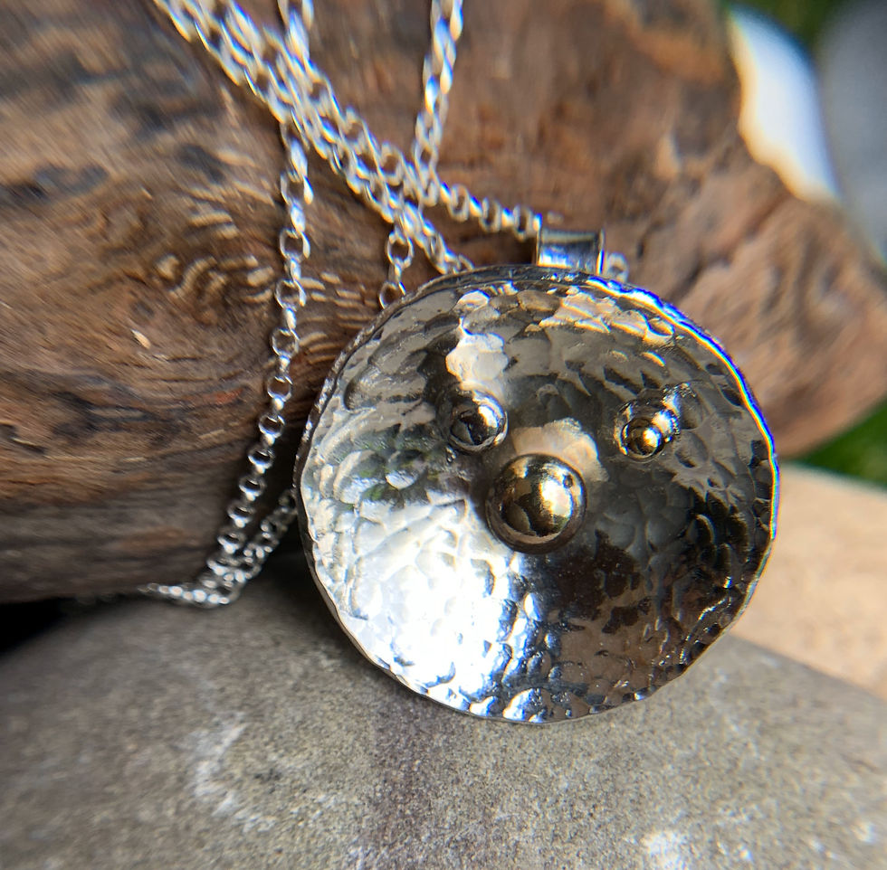 Thumbnail: Sterling silver hammered pendant with 14ct gold detail