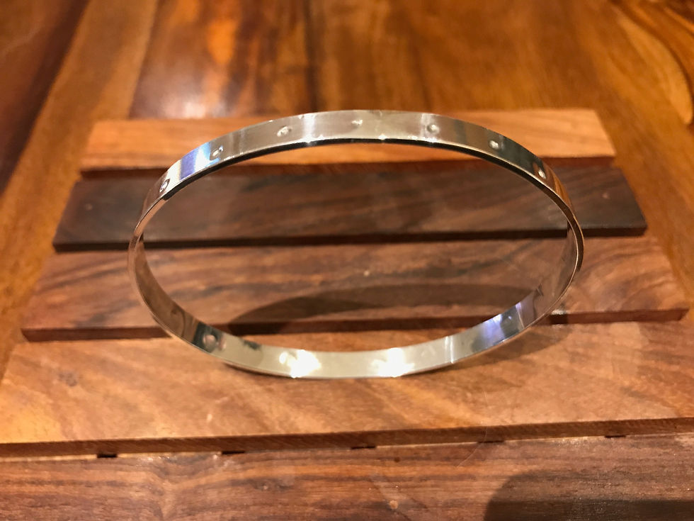 Thumbnail: Sterling silver dot patterned oval bangle