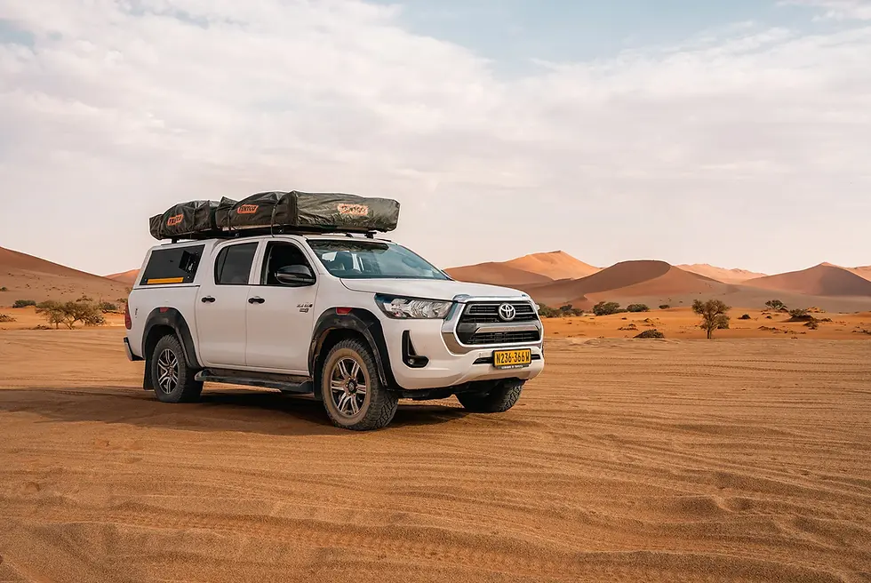 Toyota-Hilux-standing-in-the-Kalahari-Desert-of-Namibia.webp