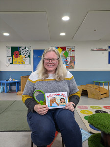 A picture of Robynn at a reading of her picture book Mirror Me