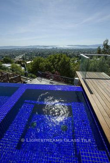 American Made Lightstreams Glass Tile Renaissance Collection Royal Blue tile for this all tile pool tile, spa tile, exterior tile using only the shiny side of the Lightstreams Royal Blue tile. 