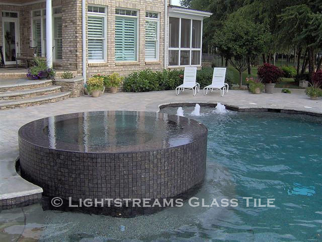 American Made Lightstreams Glass Tile Gold Iridescent Collection Silverado grey tile / silver tile is used for this all tile spa tile. Can also be used for pool tile, fountain tile, fire pit tile, wall tile, waterline tile, step marker tile, exterior tile, interior tile, accent tile, iridescent tile, backsplash tile, kitchen tile, bathroom tile, floor tile, and shower tile