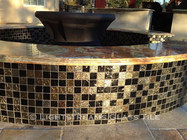 American Made Lightstreams Glass Tile Gold Iridescent Collction Obsidian black tile is used for this all tile fountain. Can also be used for pool tile, spa tile, fire pit tile, wall tile, waterline tile, step marker tile, exterior tile, interior tile, accent tile, iridescent tile, backsplash tile, kitchen tile, bathroom tile, floor tile, and shower tile