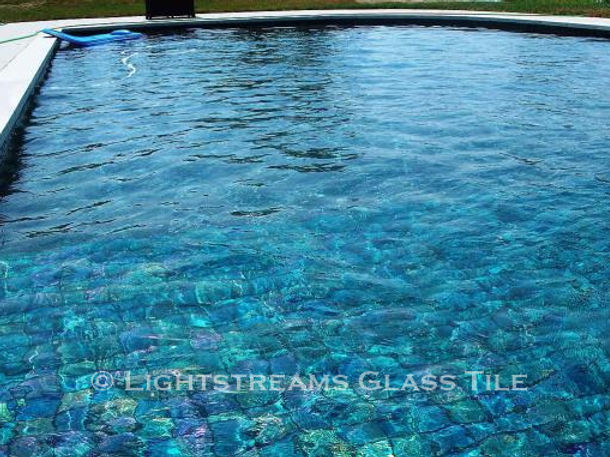 American Made Lightstreams Glass Tile Renaissance Collection Teal blue tile / green tile is used as pool tile and spa tile in this all tile pool and all tile spa showing the iridescent side of Lightstreams signature iridescent tile / shiny tile reversible tile.