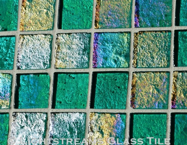 High quality American Made Lightstreams Glass Tile Renaissance Collection II Celadon 2.0 Green glass tiles are a soft earth-tone sage green.  There are subtle rainbow iridescent colors on the reverse textured side of the tile. This green tile can also be used for pool tile, spa tile, fountain tile, fire pit tile, wall tile, waterline tile, step marker tile, exterior tile, interior tile, accent tile, iridescent tile, backsplash tile, kitchen tile, bathroom tile, floor tile, and shower tile