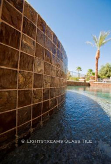 American Made Lightstreams Glass Tile Gold Iridescent Collection Bronze tile / brown tile is used for this all tile spa tile. Can also be used for pool tile, fountain tile, fire pit tile, wall tile, waterline tile, step marker tile, exterior tile, interior tile, accent tile, iridescent tile, backsplash tile, kitchen tile, bathroom tile, floor tile, and shower tile