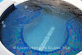 American made Lightstreams Glass Tile Renaissance Collection Peacock Blue tile as the pool tile, spa tile, and waterline tile with accent tile step markers
