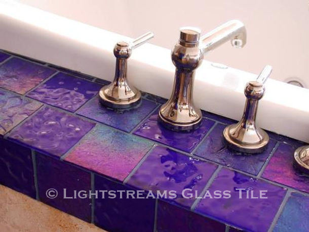 American Made Lightstreams Glass Tile Renaissance Collection Royal Blue tile outlines this bathroom tub accenting as bathroom tile accent tile spa tile
