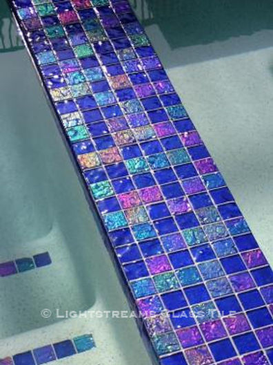 American Made Lightstreams Glass Tile Renaissance Collection Intense Blue tile is mixed with Lightstreams Jewel accent tile to be a decorative touch as pool tile, spa tile, waterline tile, wall tile, fountain tile, sun shelf tile, and step marker tile