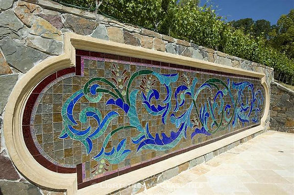 American Made Lightstreams Glass Tile Secret Garden Jewel glass accent tiles are just one of the patterns of Jewel Glass Accent tiles embellishing this beautiful custom hand-cut glass mural. This blue tile / green tile jewel glass accent tile can also be used as shower tile, bathroom tile, kitchen tile, pool tile, spa tile, waterline tile, step marker tile, floor tile, wall tile, and fountain tile.
