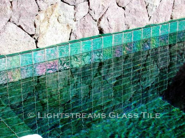 American Made Lightstreams Glass Tile Renaissance Collection Celadon green tile is used as pool tile and spa tile for this all tile pool and all tile spa showing the iridescent tile of Lightstreams signature reversible tile