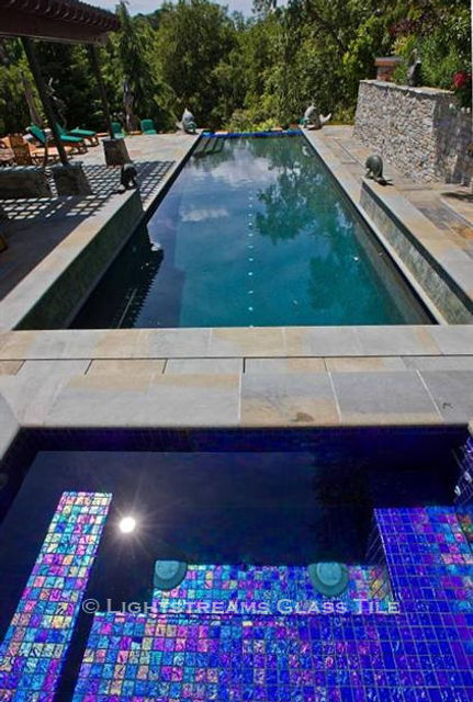 American Made Lightstreams Glass Tile Renaissance Collection Royal Blue tile for this all tile spa tile, pool tile, exterior tile. This swimming pool tile is using only the iridescent tile side of Lightstreams Royal Blue tile