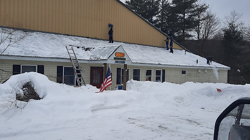 commercial ice dam prevention preformed by Total Roofing VT