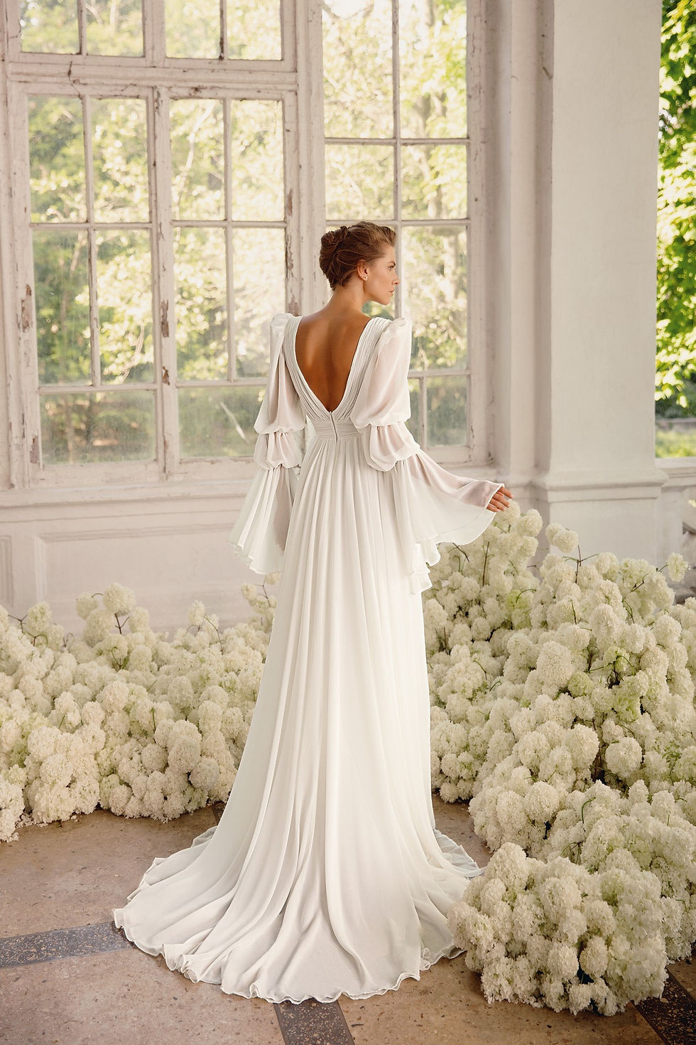 Thumbnail: Deep neckline chiffon wedding dress with a small train