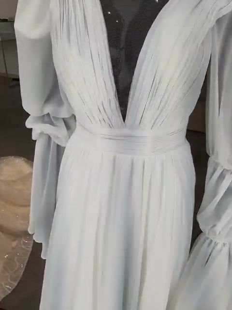 Thumbnail: Deep neckline chiffon wedding dress with a small train