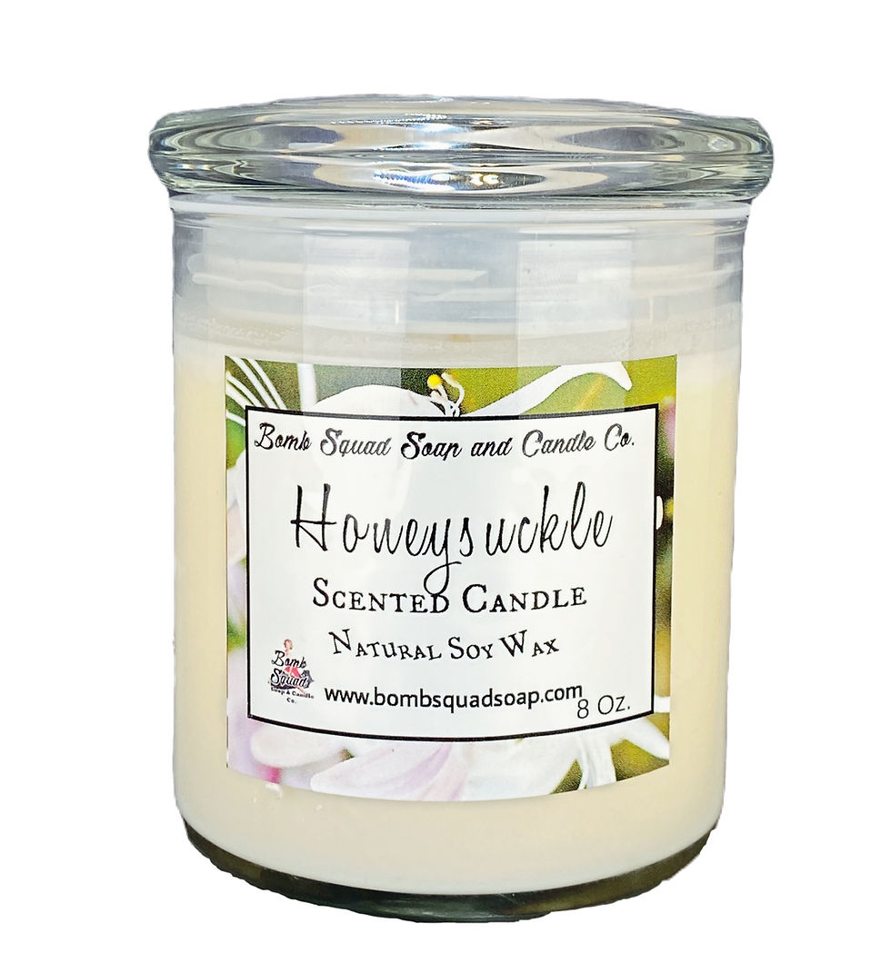 Thumbnail: Large 16oz Honeysuckle hand-poured soy wax candle by Bomb Squad Soap in a clear glass jar.