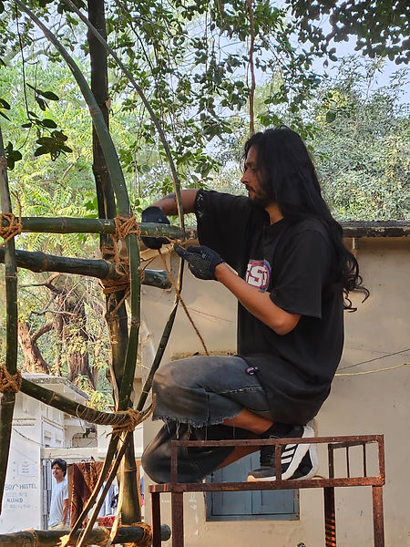 Tarun Butta working on a site-specific installation 
Nandan Mela 2023
Kala Bhavana 
Visva Bharati University
