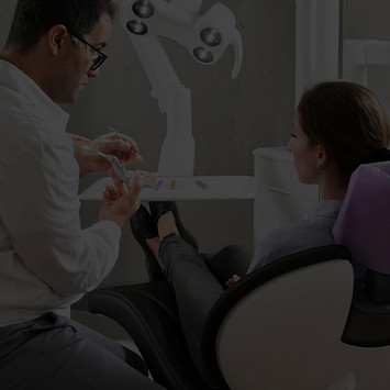 man in white dress shirt sitting on black office rolling chair_edited_edited_edited.jpg