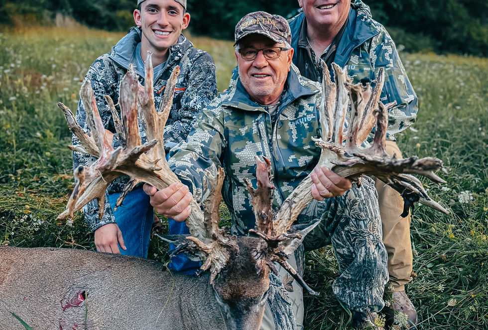Mature platinum trophy whitetail buck taken on managed private land at Quest Haven Lodge
