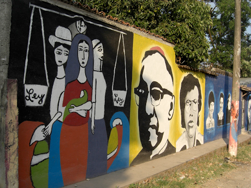 A tribute mural in remembrance of the 75,000 people killed during the El Salvador Civil War and archbishop Oscar Romero, who Salvadorian forces assassinated for criticizing the Salvadorian military’s human rights abuses.