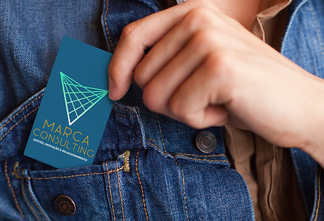mockup of a woman keeping the Consulting Brand Card in the front pocket of her Jean Jacket