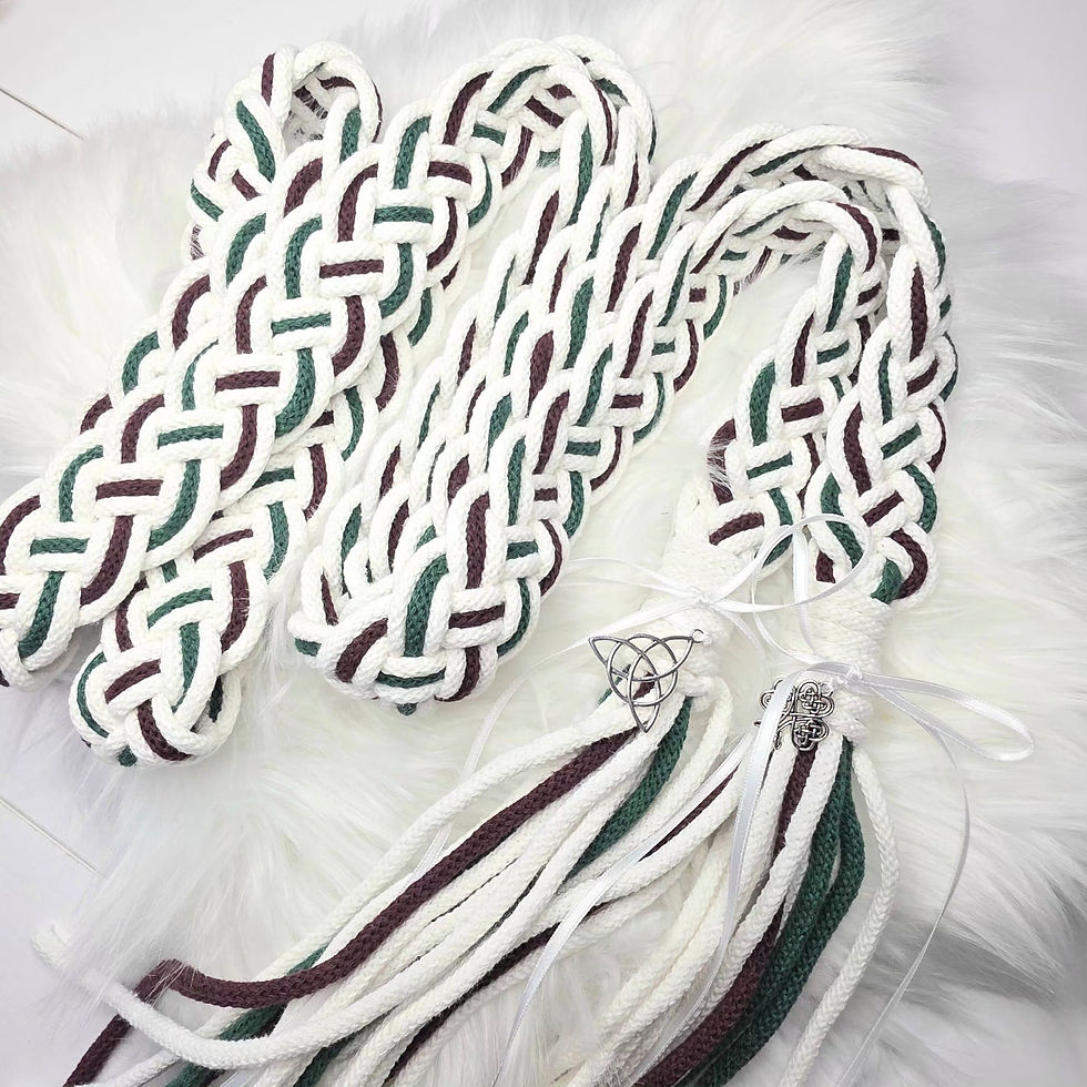 Luxury Handfasting Cord Ireland in white with burgundy and pine green woven strands, tassels and Celtic-inspired charms.