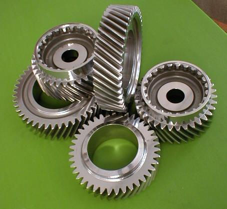 Drive train truck gears centrifugally finished for isotropic surface effect