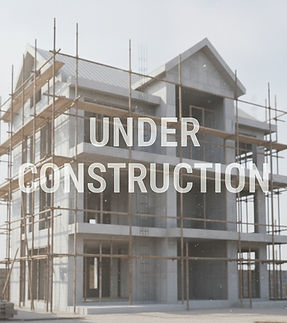 blurred house rendering with text on top saying _Under Construction_.jpg