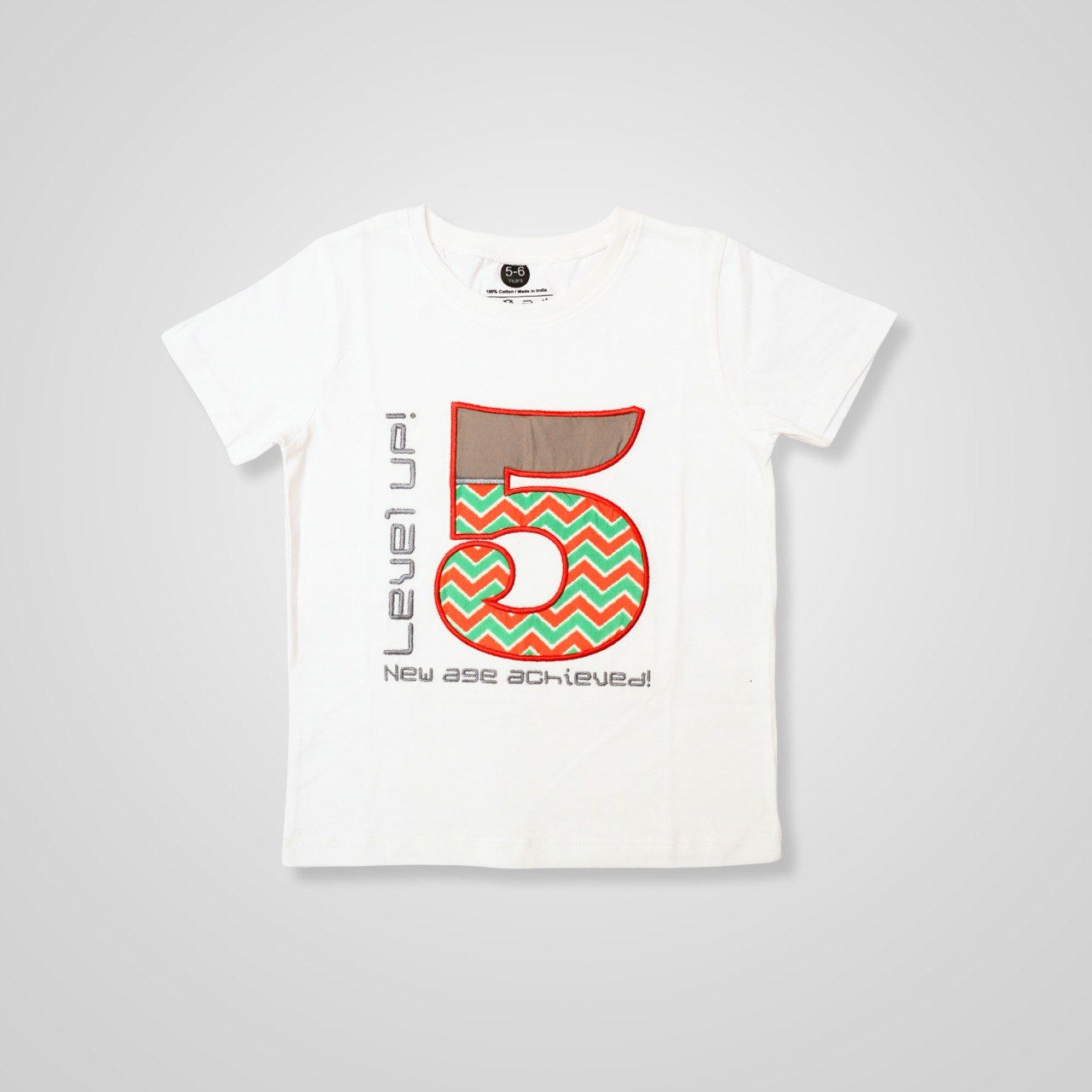 a photo of a t shirt by Hugs&Hues having number 5 and Level Up embroidered on it