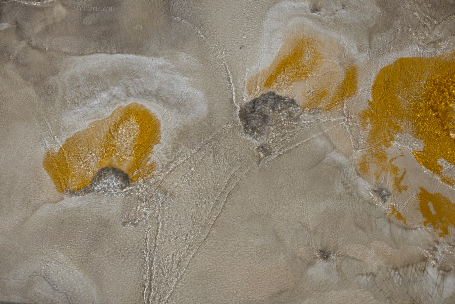 Close up of geyser water runoff  at Yellowstone National Park - via NVilloria.com