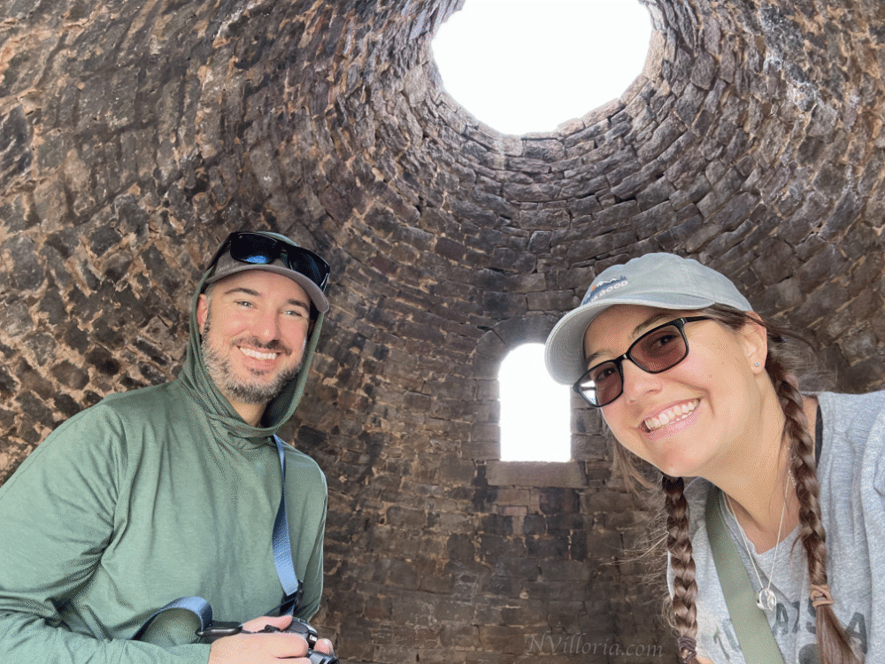 Two people inside a structure at the Ward Charcoal Ovens - via NVilloria.com