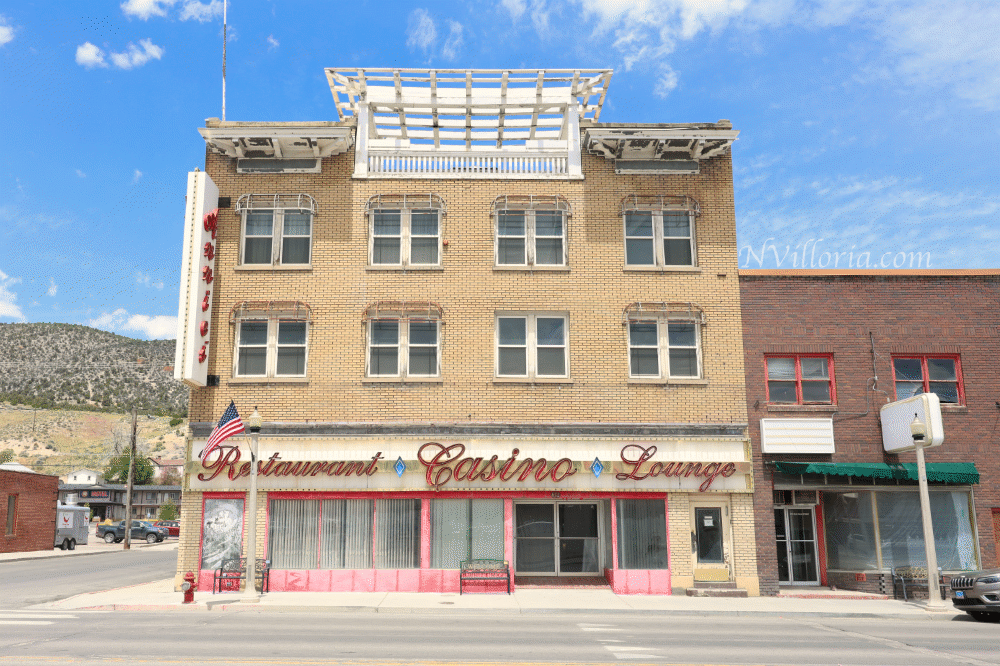 Views from the sidewalk of the exterior of a brick building in Ely, Nevada - via NVilloria.com