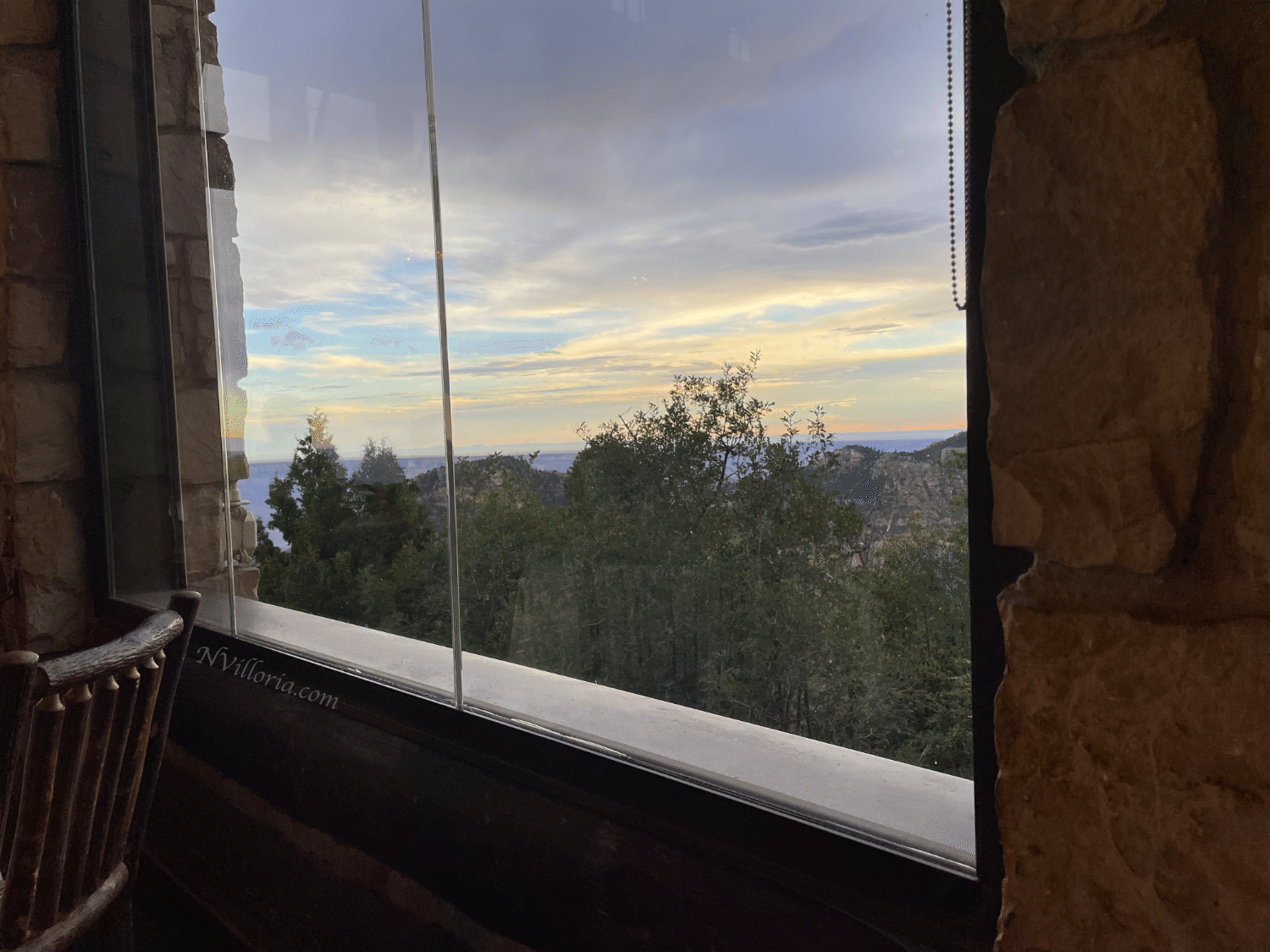 Views out a window at sunset at the Grand Canyon North Rim - via NVilloria.com