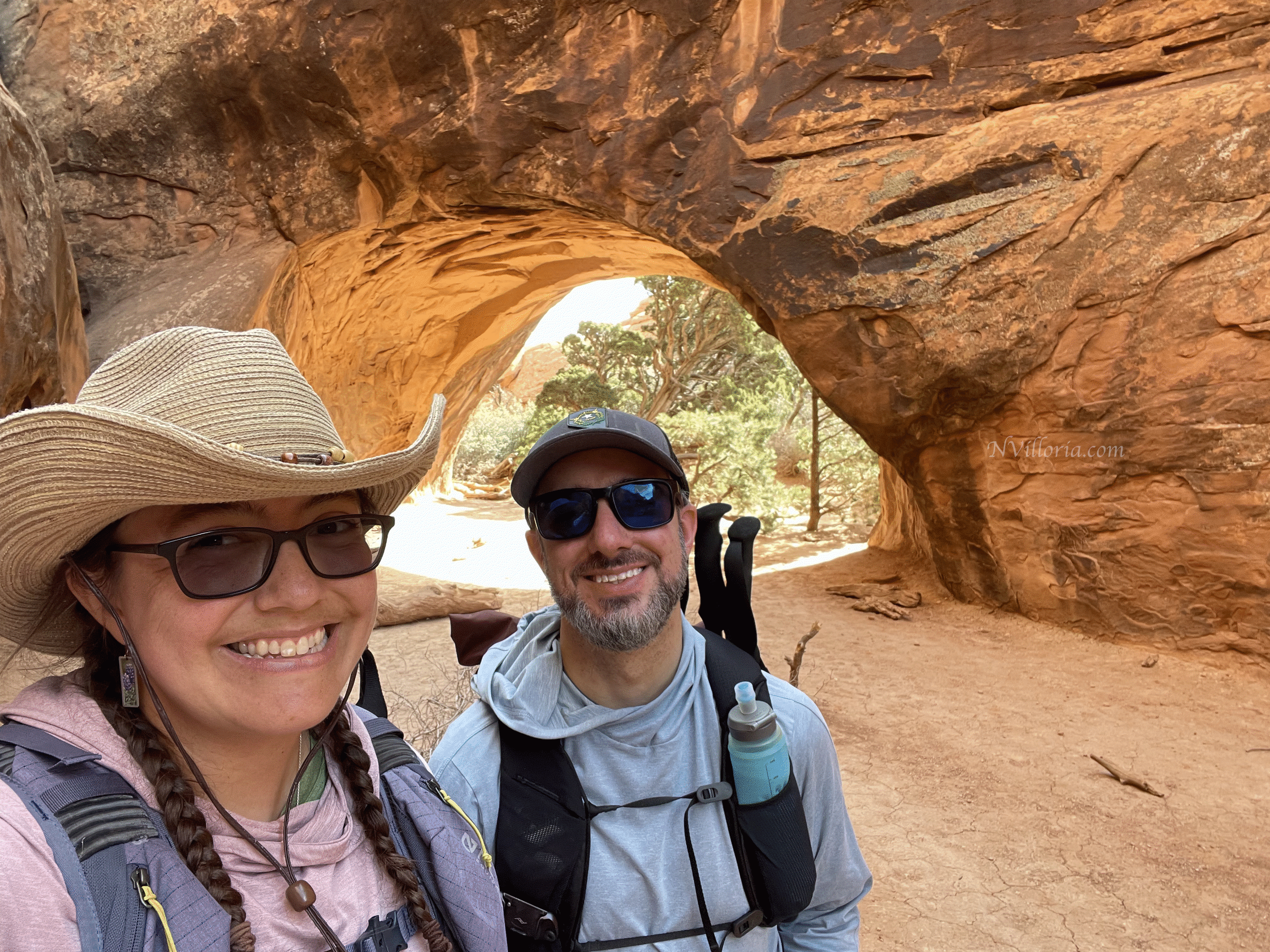 Nikki and Jason at Navajo Arch at Arches National Park - via NVilloria.com