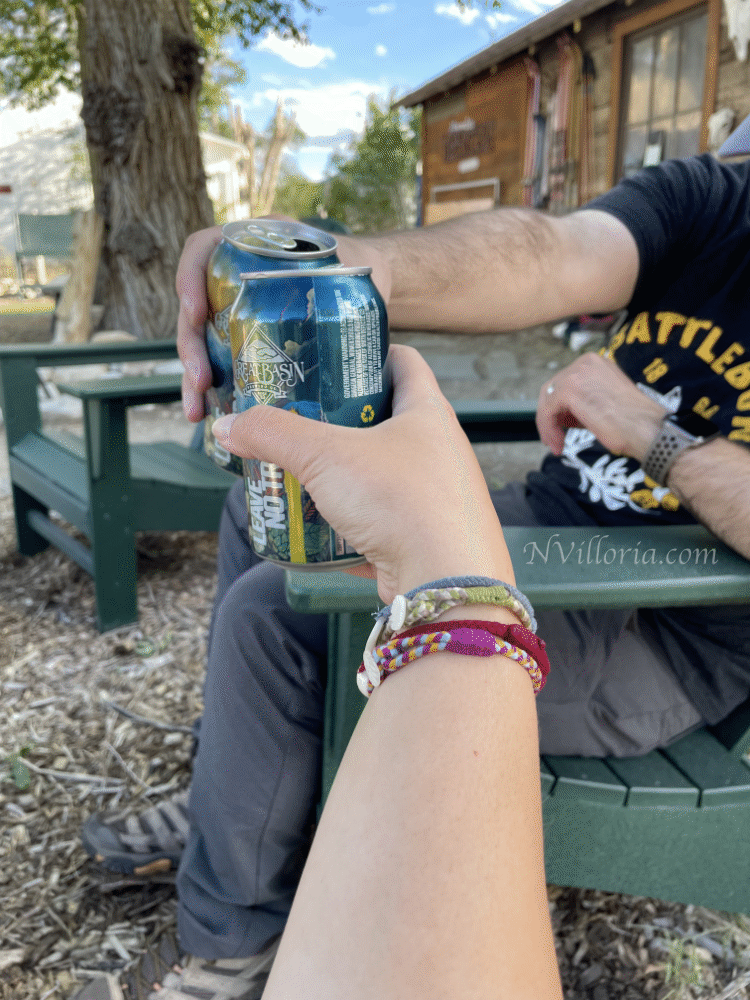 Hands holding beer cans together via NVilloria.com blog