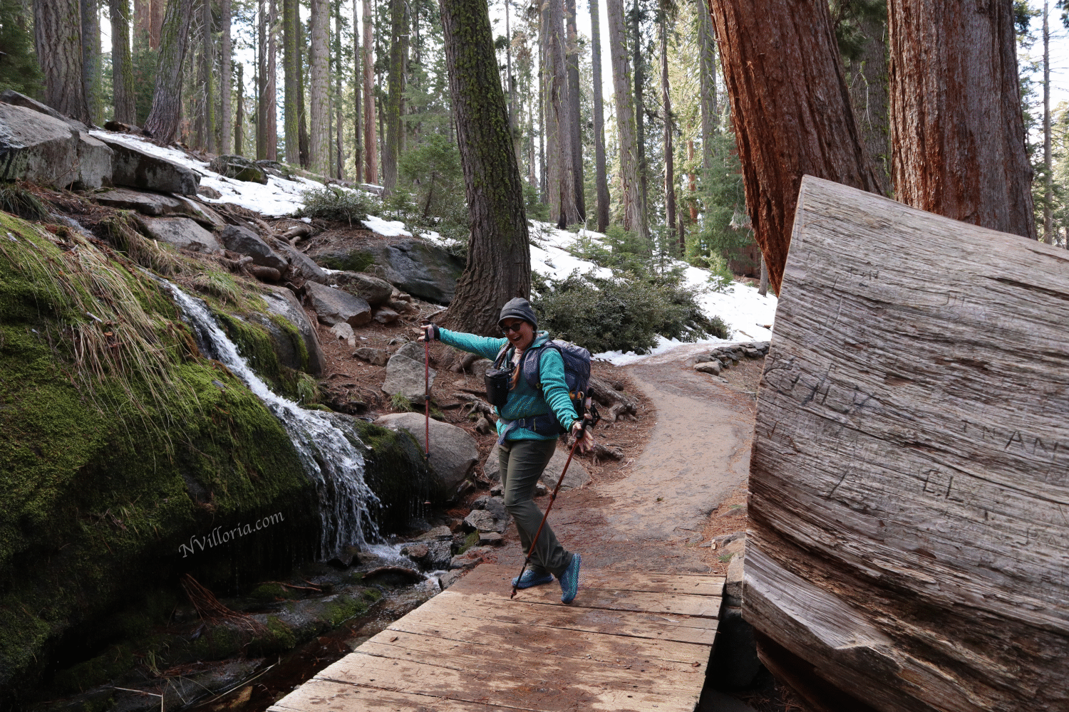 Nikki on a bridge by a waterfall at Sequoia National Park via NVilloria.com