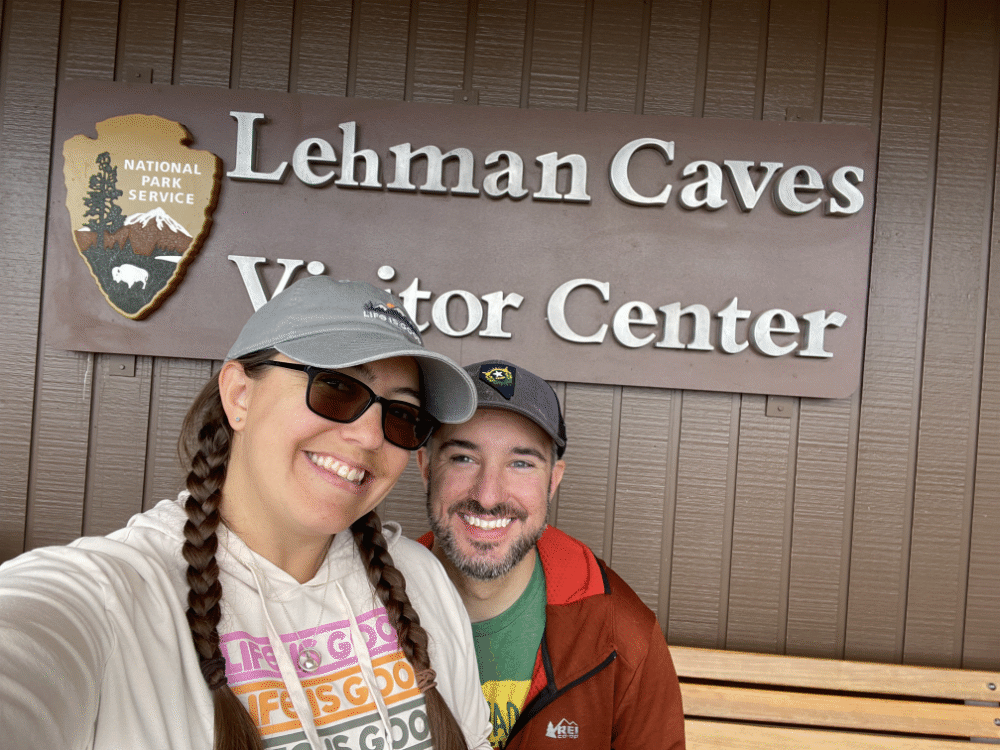 Two people standing outside the visitor center at Lehman Caves - via NVilloria.com Travel blog