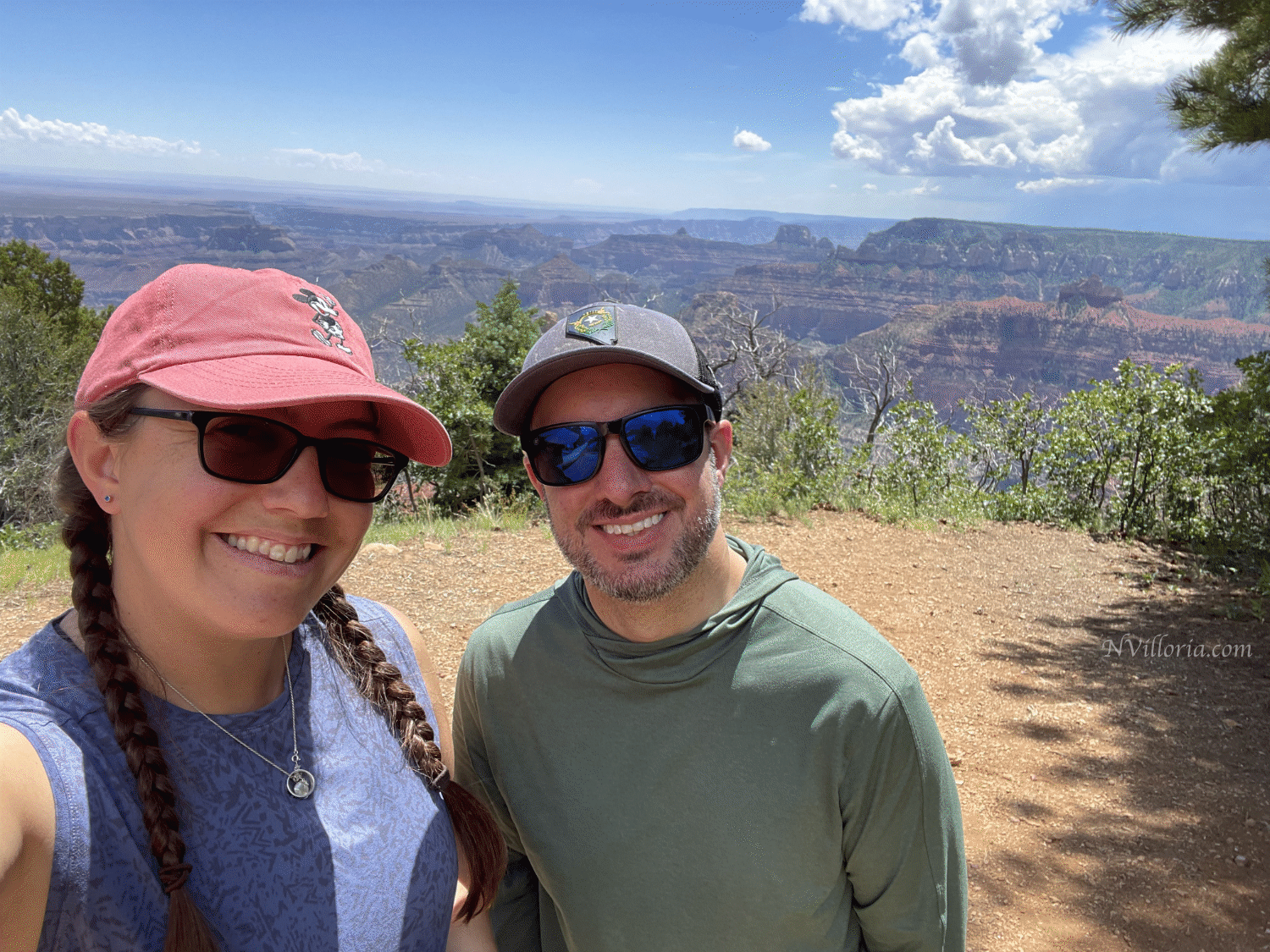 Two people smiling at the Grand Canyon North Rim - via NVilloria.com
